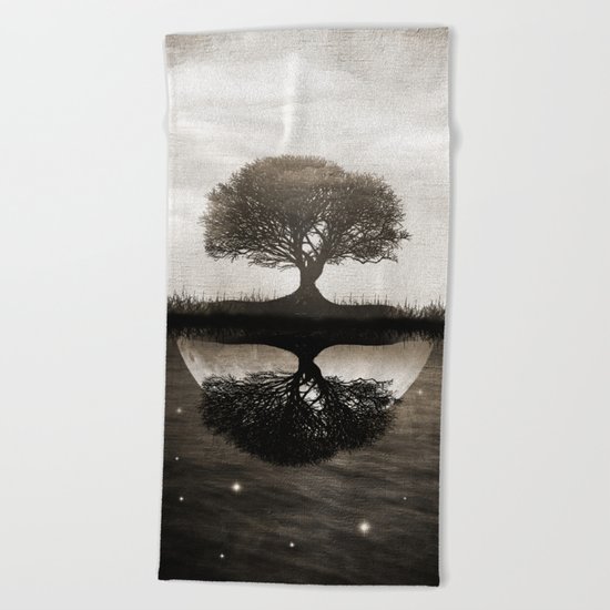 The lone Night reflex Beach Towel
