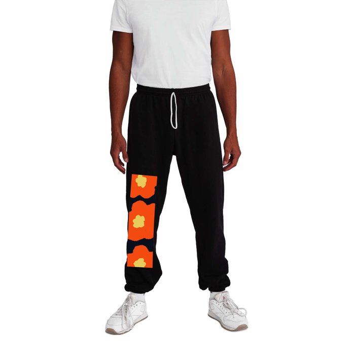 Large Pop-Art Retro Flowers in Orange on Black Background  Sweatpants