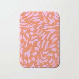 Distorted groovy checks pattern - orange pink jelly Bath Mat