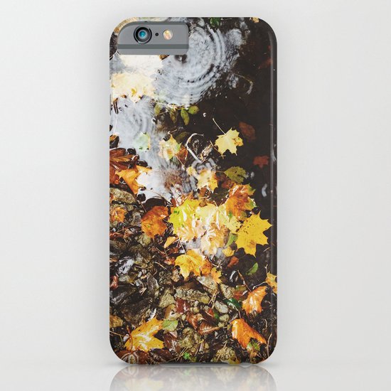 Detail of autumnal leaves and rain in a puddle. Norfolk, UK iPhone & iPod Case