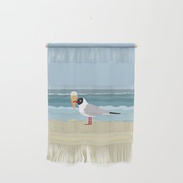 Cute seagull with ice cream by the sea Wall Hanging