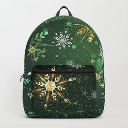 Golden Snowflakes on Green Background Backpack