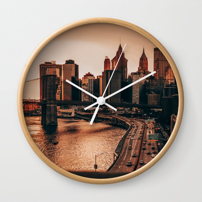 Brooklyn Bridge and Manhattan skyline at sunset in New York City Wall Clock