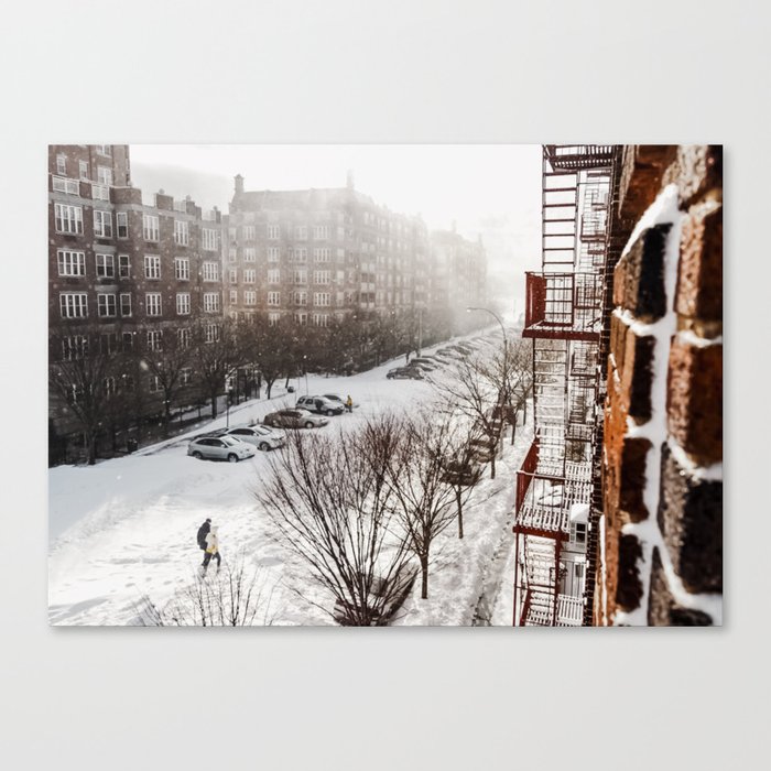 Brooklyn street covered in snow during winter snowstorm blizzard in New York City Canvas Print