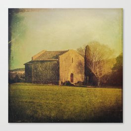 A cute small stone house without windows Canvas Print