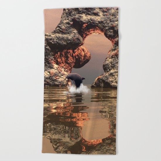 Dolphin in the sunset Beach Towel