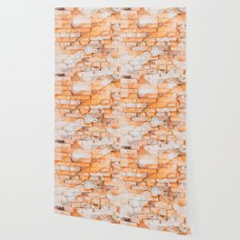 Retro style background or texture in double exposure. The stonewall from old orange bricks.  Wallpaper
