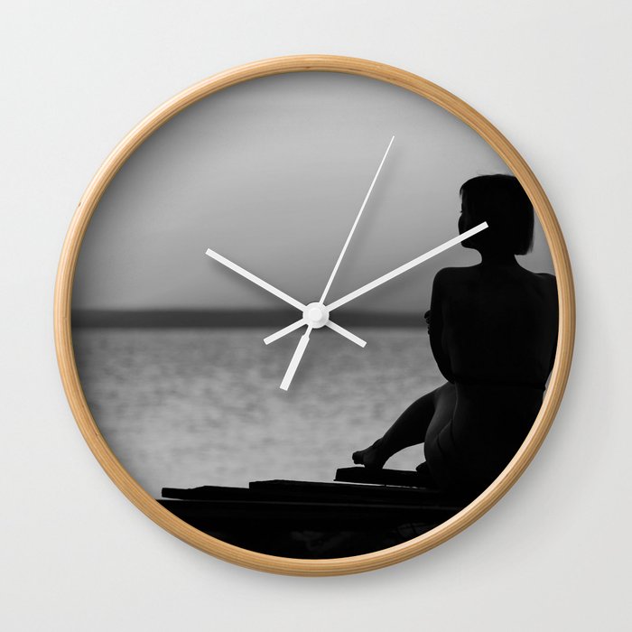 Silhouette of Woman Sitting on Dock during Sunset black and white photograph - photography Wall Clock