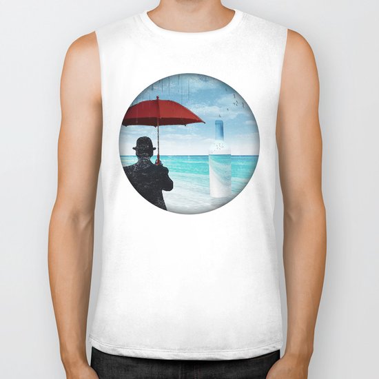 Chaplin at the beach in the rian Biker Tank