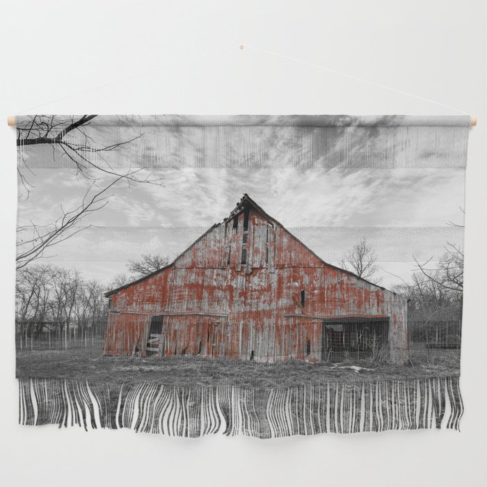 Worn Paint - Rustic Red Barn Against Black and White Landscape on Early Spring Day in Missouri Wall Hanging