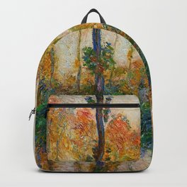 Autumn Trees in full fall foliage by the marshes landscape painting by Claude Monet Backpack