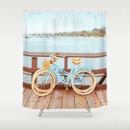 Two retro bicycles standing on Santa Barbara pier, California, USA. Vintage filter with muted teal blue and orange colors. Shower Curtain