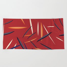 Leaves in a red background Beach Towel