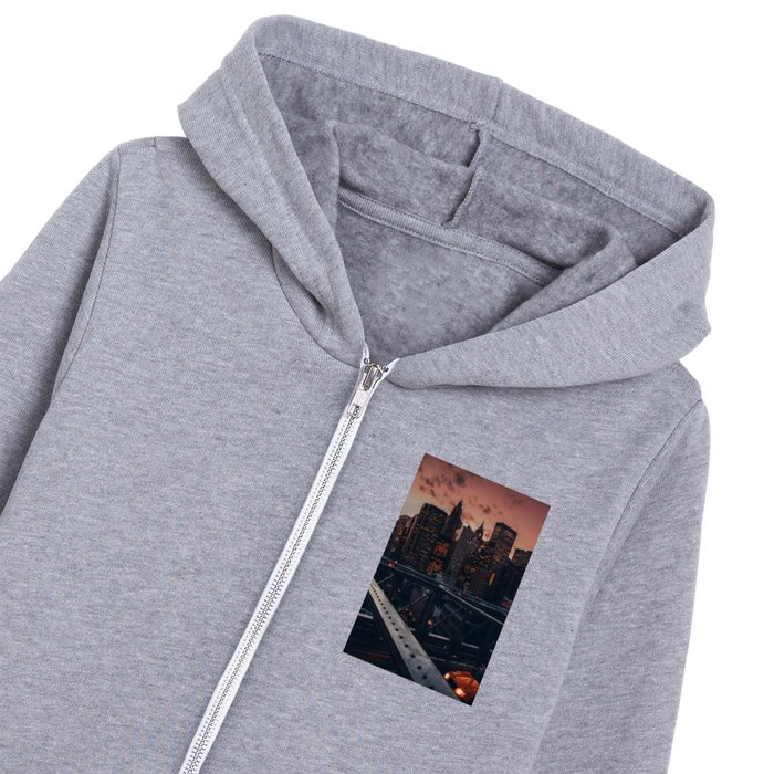 New York City Manhattan Skyline and Brooklyn Bridge with a yellow taxi at sunset Kids Zip Hoodie