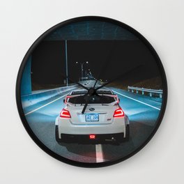 White wrx sti parked on an empty highway Wall Clock