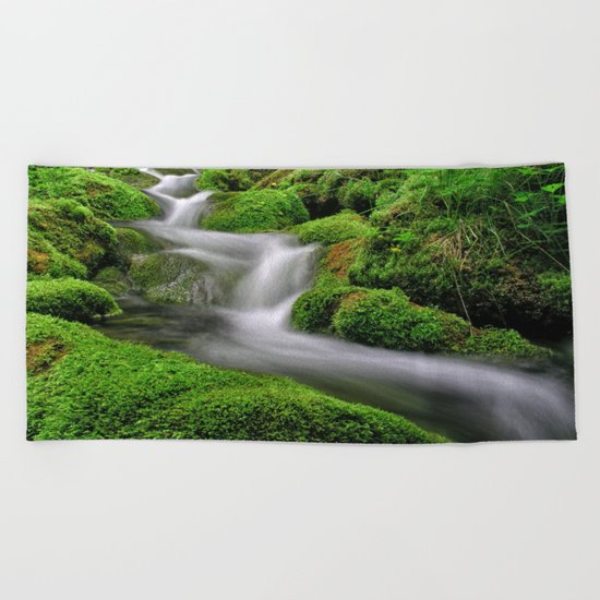 Flowing water Beach Towel