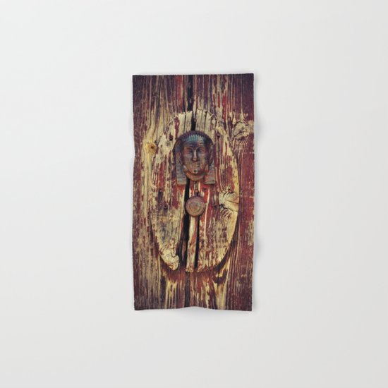 weathered wooden door with agypt door knocker Hand & Bath Towel