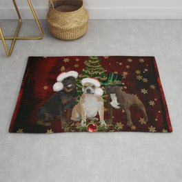 Christmas time, funny Staffordshire Bull Terrier and Rottweiler with christmas hat Rug