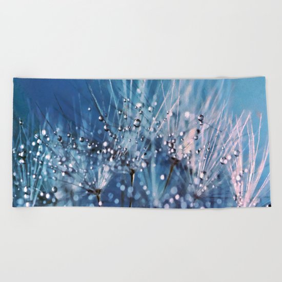 Dew on dandelions Beach Towel