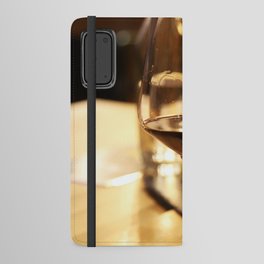 Glass of red wine on a table Android Wallet Case