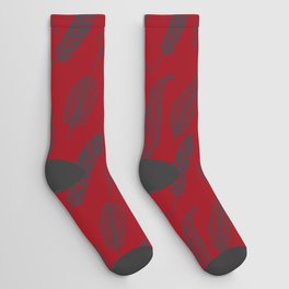 Black Feather on Christmas Red Socks
