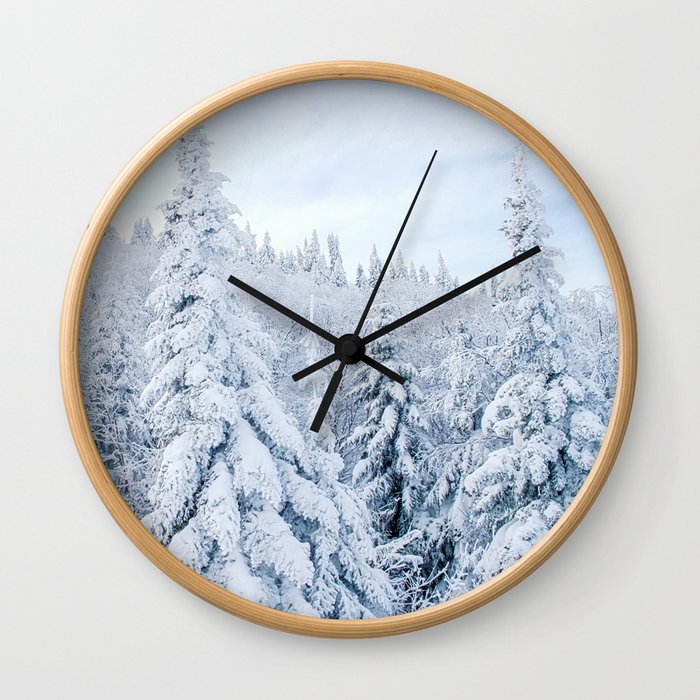 Snow covered forest Wall Clock