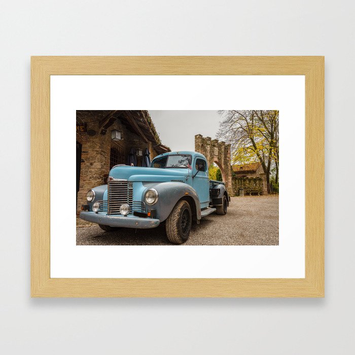Historic blue-colored pickup parked in the streets of an historic Italian village Framed Art Print