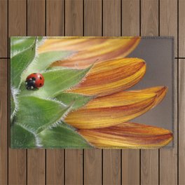 Ladybug on Sunflower Outdoor Rug