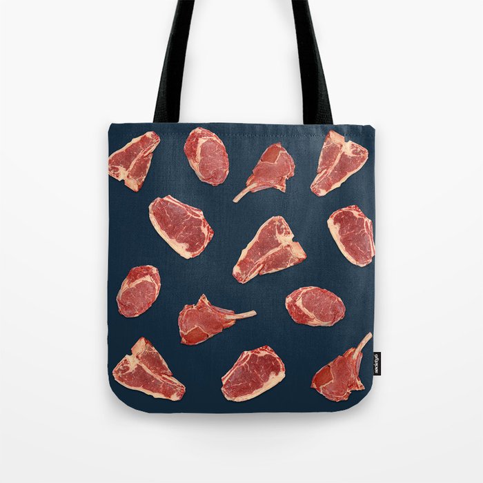 Pattern of fresh beef steaks over blue Tote Bag