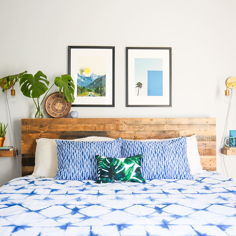 bed with blue and white dye pattern duvet cover