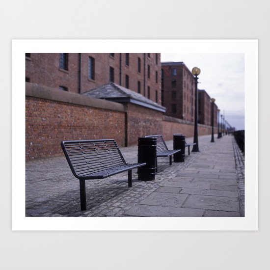 a row of benches Art Print