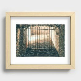 A daunting staircase leading to an iron grid in a medieval dungeon Recessed Framed Print