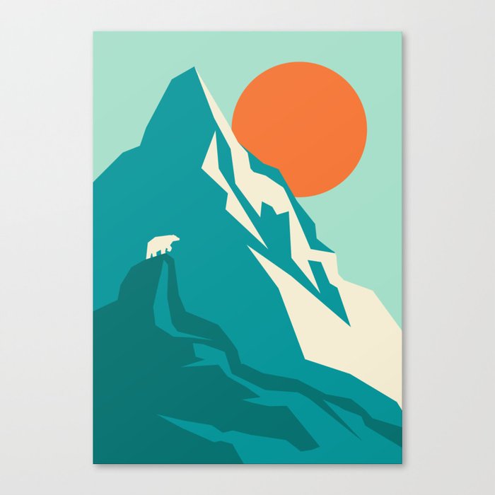 As the sun rises over the peak Canvas Print