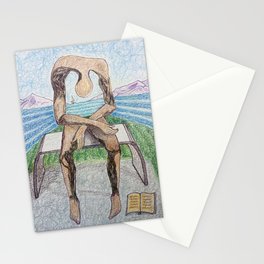 spin-off art: melancholy sculpture with a dropped open book and sea view Stationery Cards