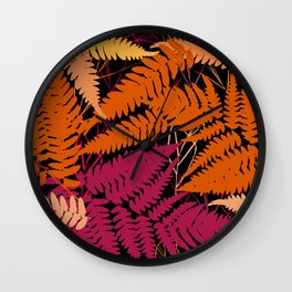 leafs tropical fern palm. orange pink brown silhouette on Black background Wall Clock
