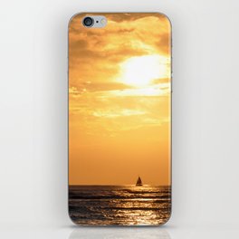 Sunset with sailboat iPhone Skin