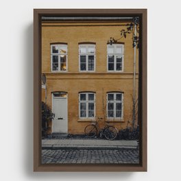 Orange house and a bike Framed Canvas