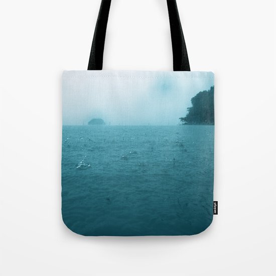 Raining on the ocean Tote Bag