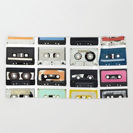 Collection of various vintage audio tapes on white background. Each one is shot separately Beach Towel