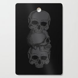 3 Black Skulls Stacked On Top of Each Other Cutting Board