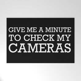 GIVE ME A MINUTE TO CHECK MY CAMERAS Welcome Mat