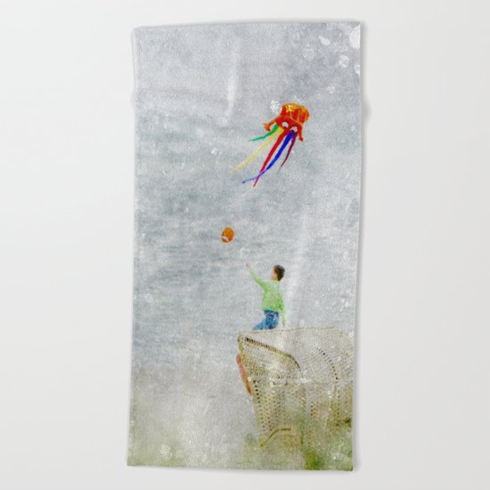 Boy at the beach Beach Towel