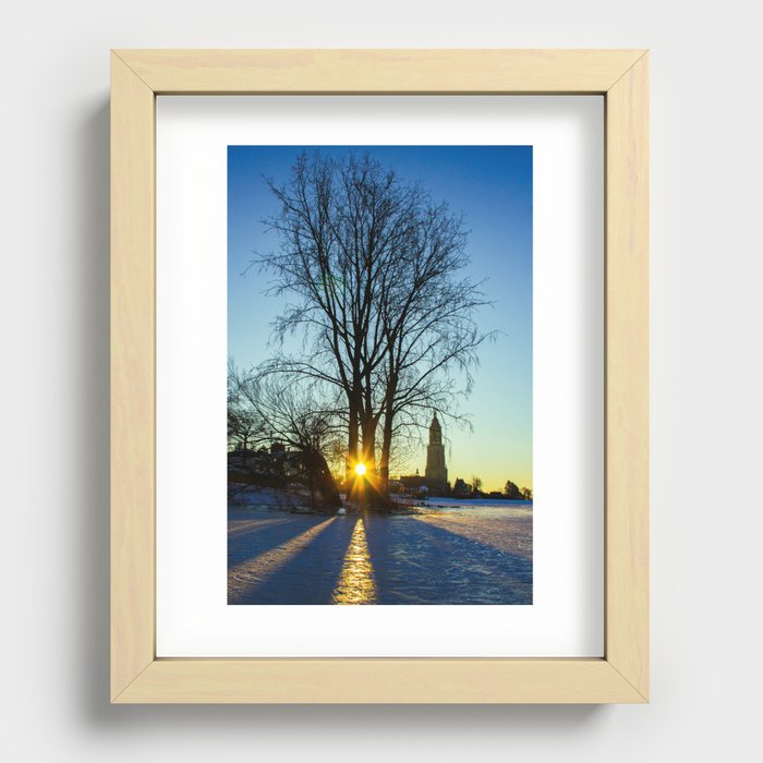 Sunrise on a frozen lake with a little church in the background Recessed Framed Print