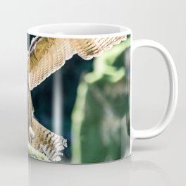 Eagle-owl landing on a stump Coffee Mug