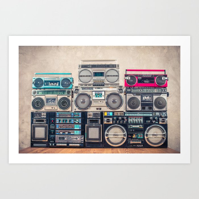 Retro old school design ghetto blaster stereo radio cassette tape recorders  boombox tower from circa 1980s front concrete wall background. Vintage  style filtered photo Art Print by Elegant Decor