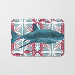 Great white shark swimming on a pink and cool blue patterned background Bath Mat