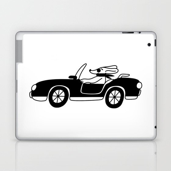 The dog drives the car Laptop & iPad Skin