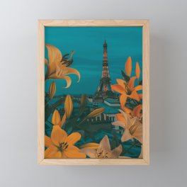 Lilies in bloom against the background of evening Paris. Framed Mini Art Print