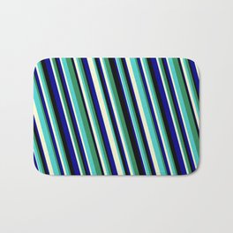 [ Thumbnail: Eyecatching Sea Green, Turquoise, Light Yellow, Dark Blue, and Black Colored Stripes/Lines Pattern Bath Mat ]