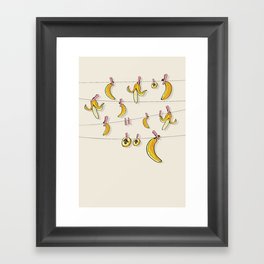Bananas on clothespins Framed Art Print